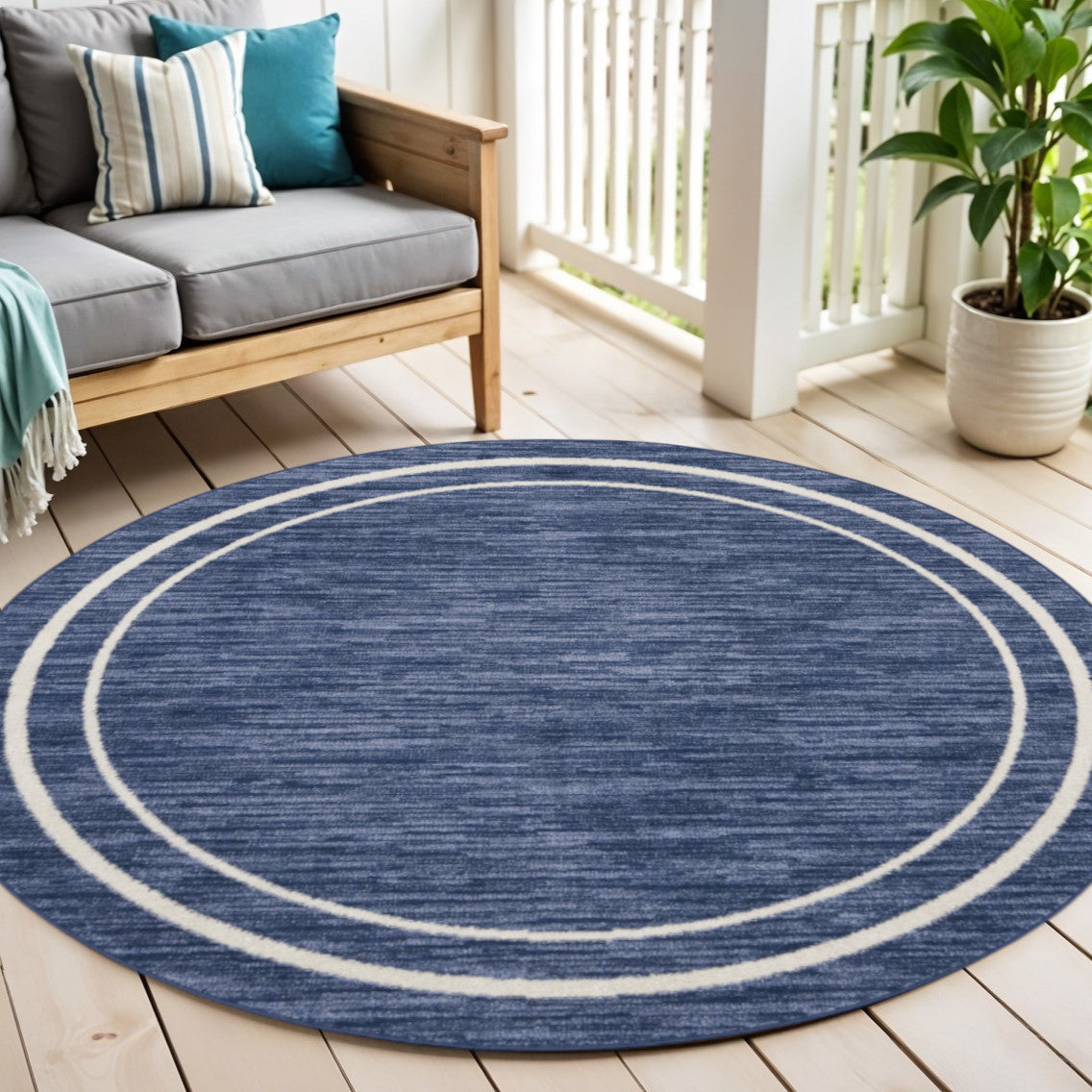 4 Navy Blue And Ivory Round Indoor Outdoor Area Rug