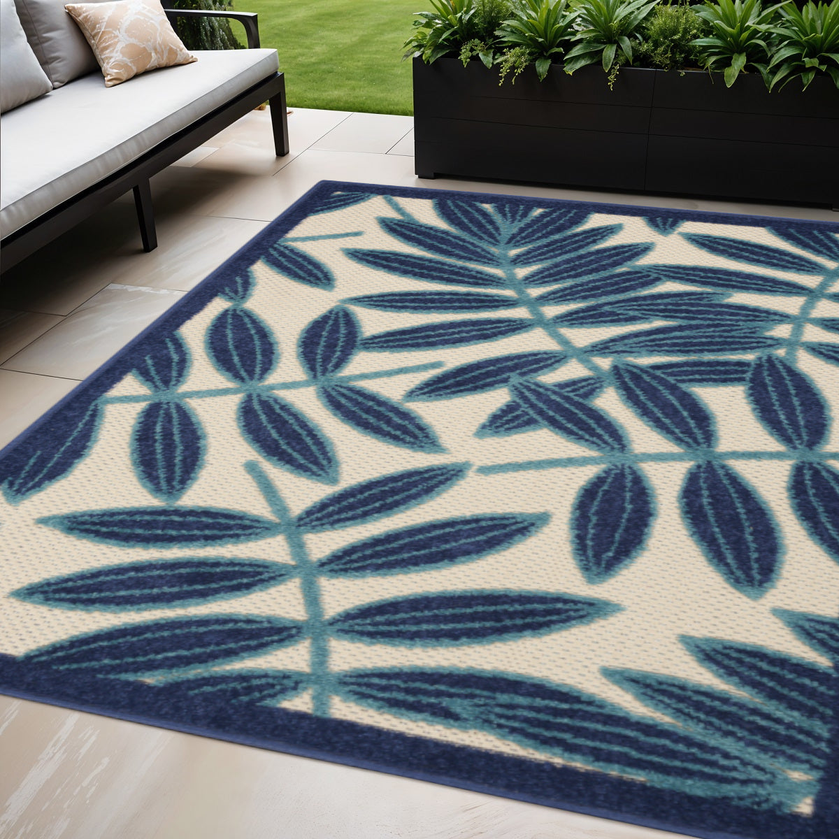 5 X 8 Navy Blue And Ivory Palm Leaf Indoor Outdoor Area Rug