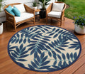 8 Navy Blue And Ivory Round Botanical Leaves Indoor Outdoor Area Rug