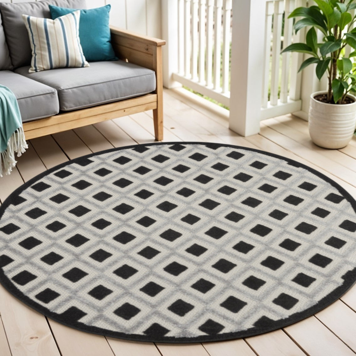 4 Black And White Round Geometric Indoor Outdoor Area Rug