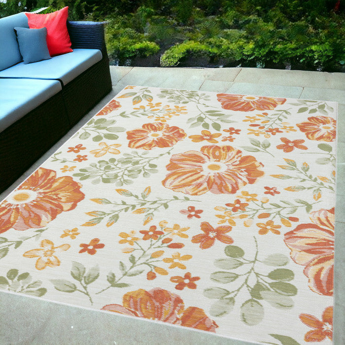 5' X 7' Ivory Green And Orange Floral Stain Resistant Indoor Outdoor Area Rug