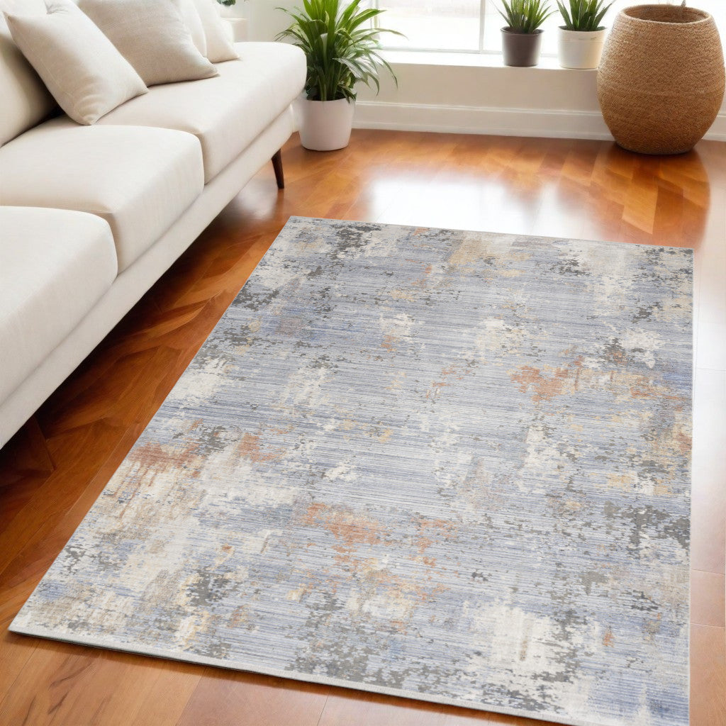 5' X 8' Beige Blue and Gray Abstract Area Rug With Fringe