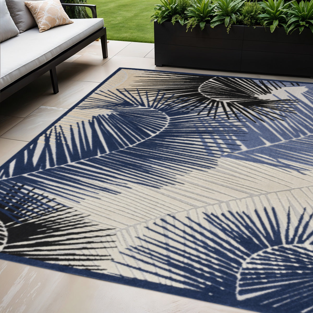5 X 7 Navy Blue Ivory And Black Palm Leaf Indoor Outdoor Area Rug