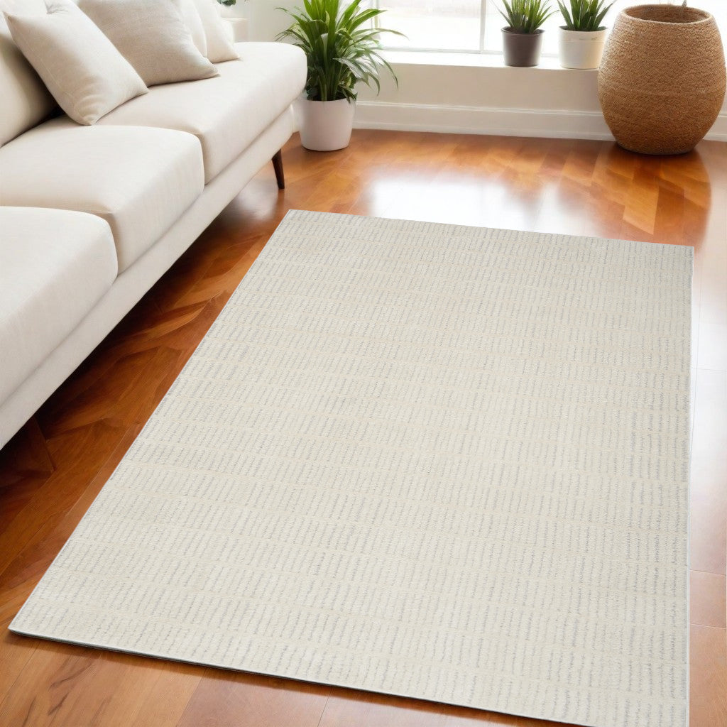 5' X 7' Ivory and Gray Abstract Area Rug