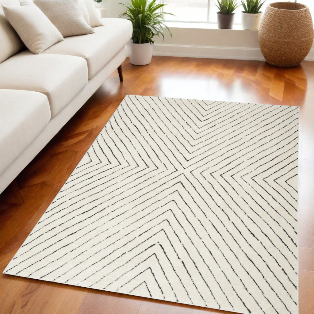 5' X 7' Ivory and Black Abstract Area Rug