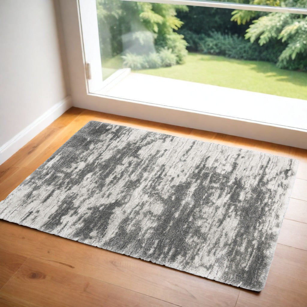 4' X 6' Charcoal and Ivory Abstract Shag Area Rug