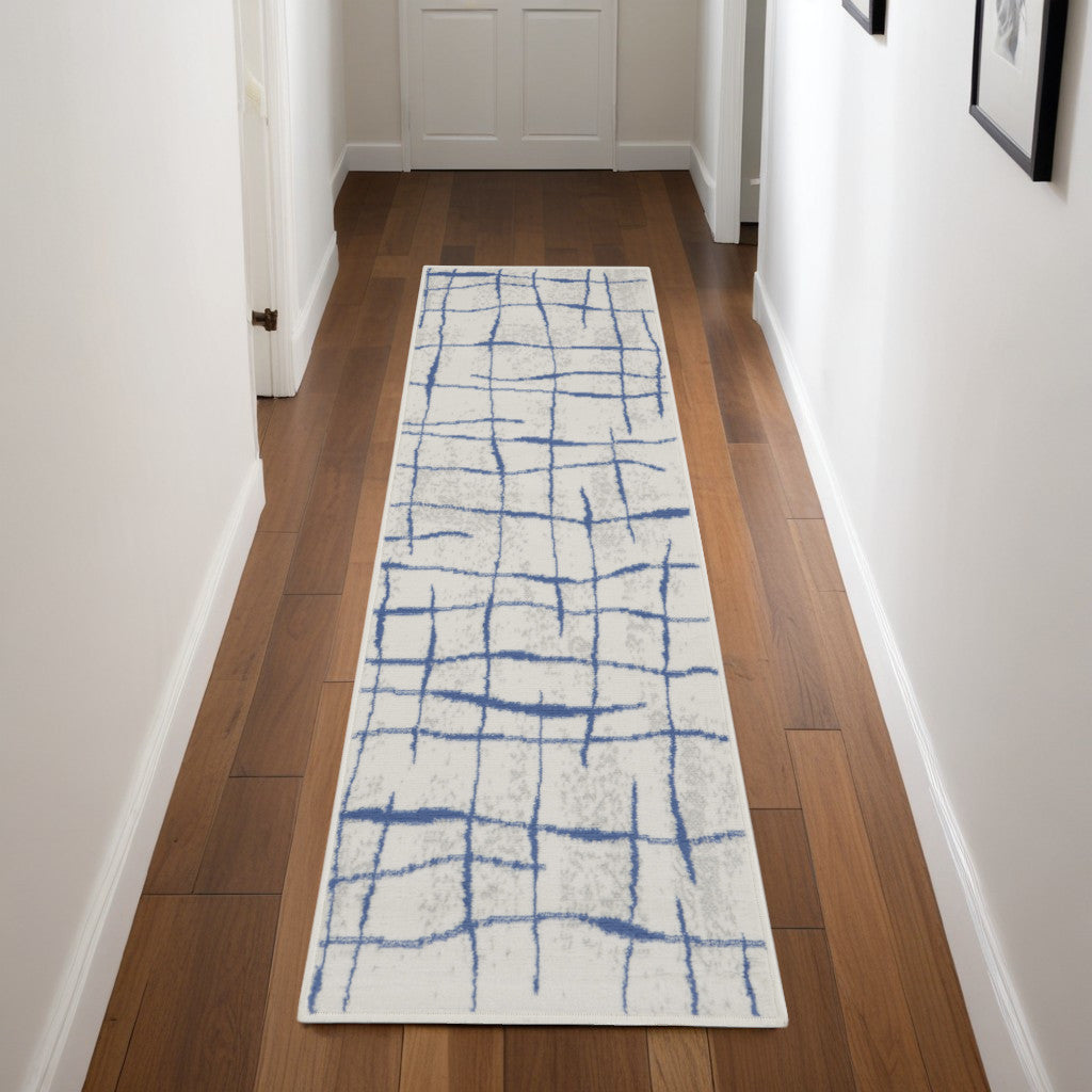8' Ivory and Blue Abstract Distressed Non Skid Runner Rug