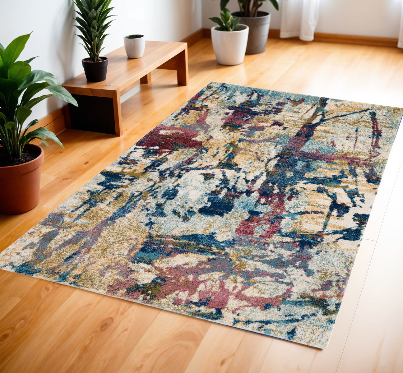 4' X 6' Cream Blue and Green Abstract Distressed Area Rug