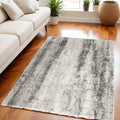 5' X 7' Charcoal and Ivory Abstract Shag Area Rug