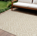 8 X 10 Cream And Beige Geometric Indoor Outdoor Area Rug