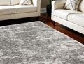 7' X 9' Charcoal and Ivory Abstract Shag Area Rug