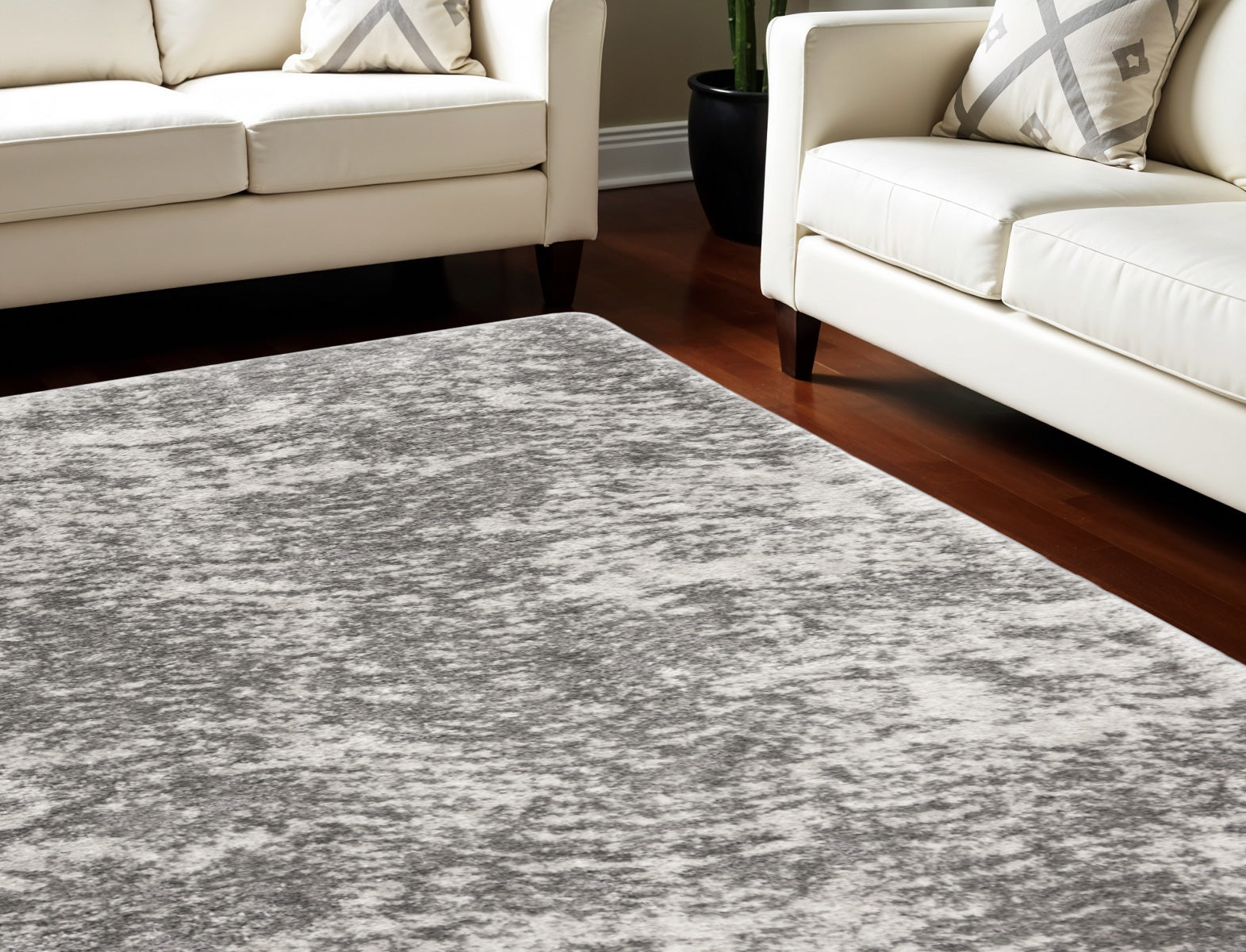 7' X 9' Charcoal and Ivory Abstract Shag Area Rug