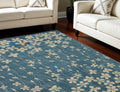 9' X 12' Turquoise and Cream Floral Area Rug