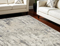9' X 12' Cream Abstract Power Loom Area Rug
