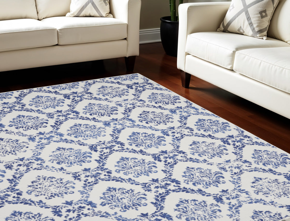 8' X 12' Ivory and Navy Blue Damask Distressed Non Skid Area Rug
