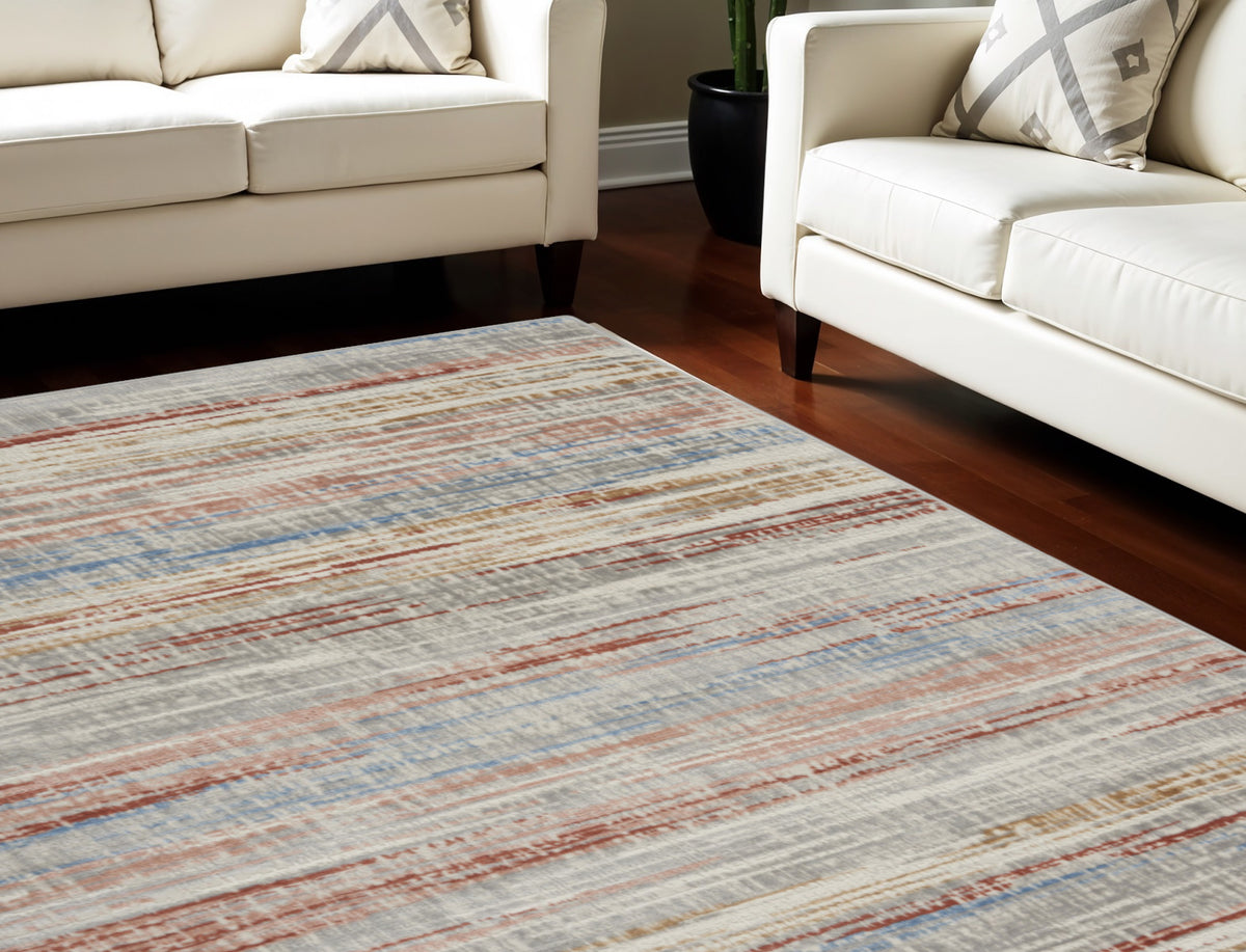 9' X 12' Ivory Red and Blue Abstract Non Skid Area Rug