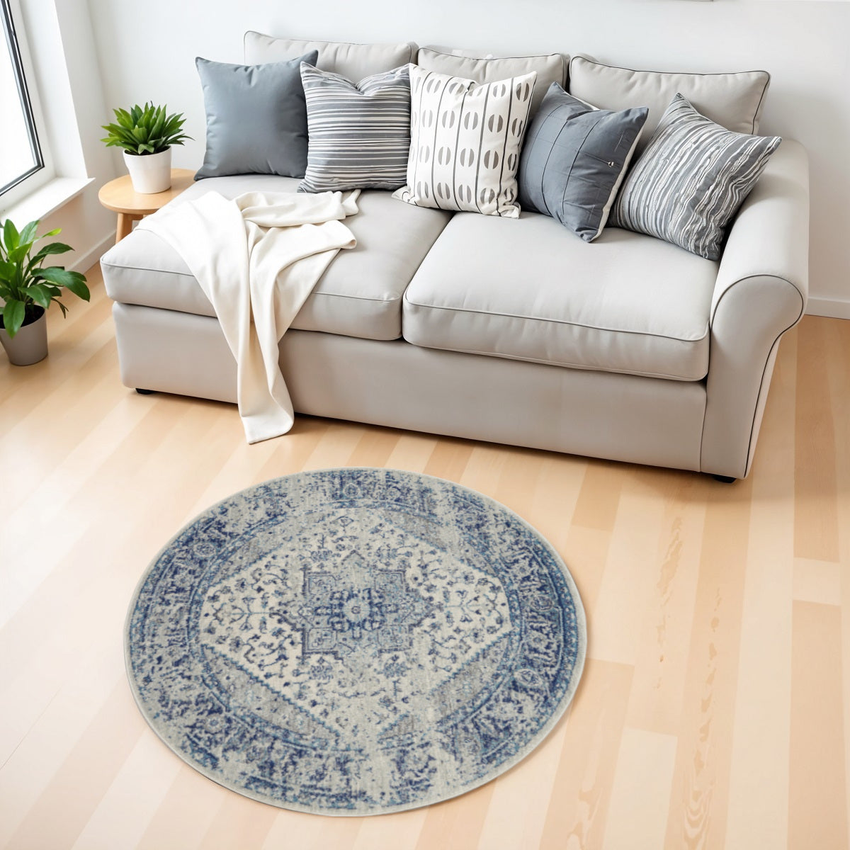 4' Ivory And Light Blue Floral Medallion Distressed Round Rug