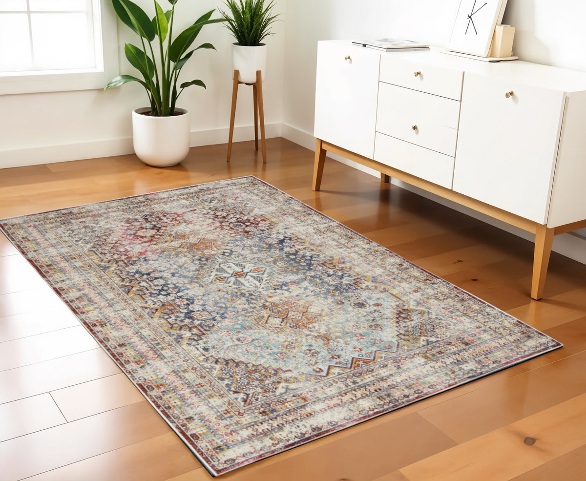4' X 6' Ivory Red And Orange Geometric Distressed Area Rug