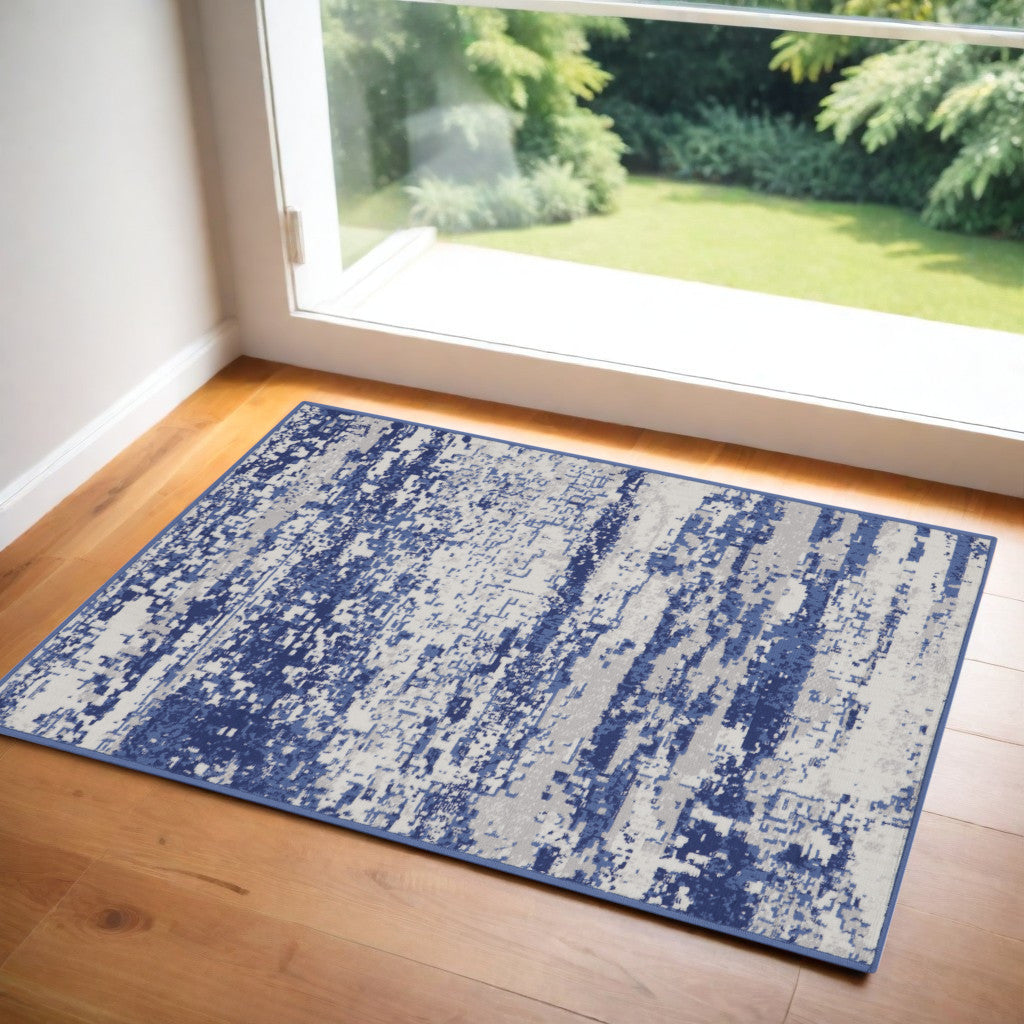 3' X 5' Ivory and Navy Blue Abstract Area Rug