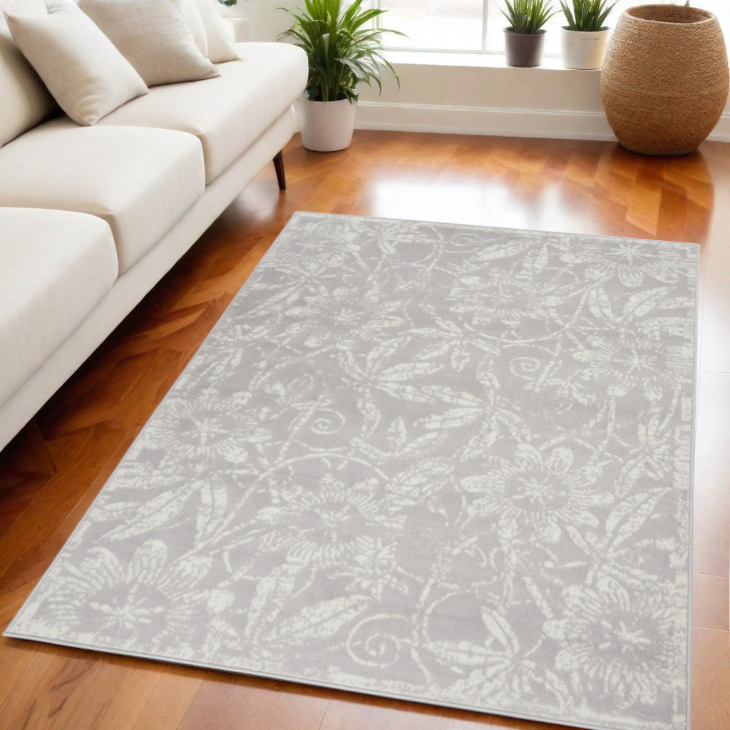 5' X 7' Gray and Ivory Floral Distressed Area Rug