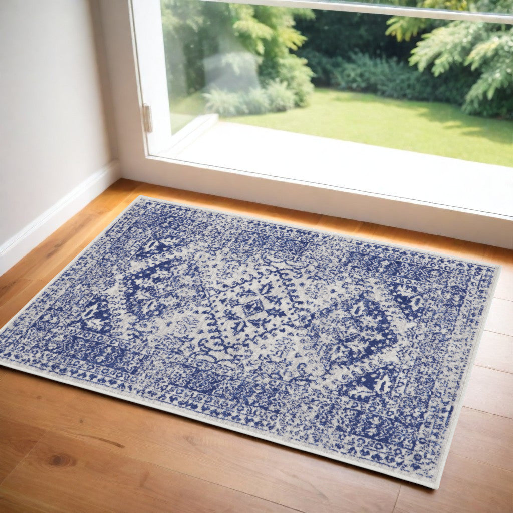 3' X 5' Ivory and Navy Blue Geometric Distressed Area Rug