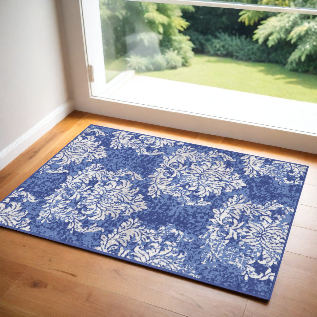 3' X 5' Navy Blue and Ivory Damask Distressed Area Rug