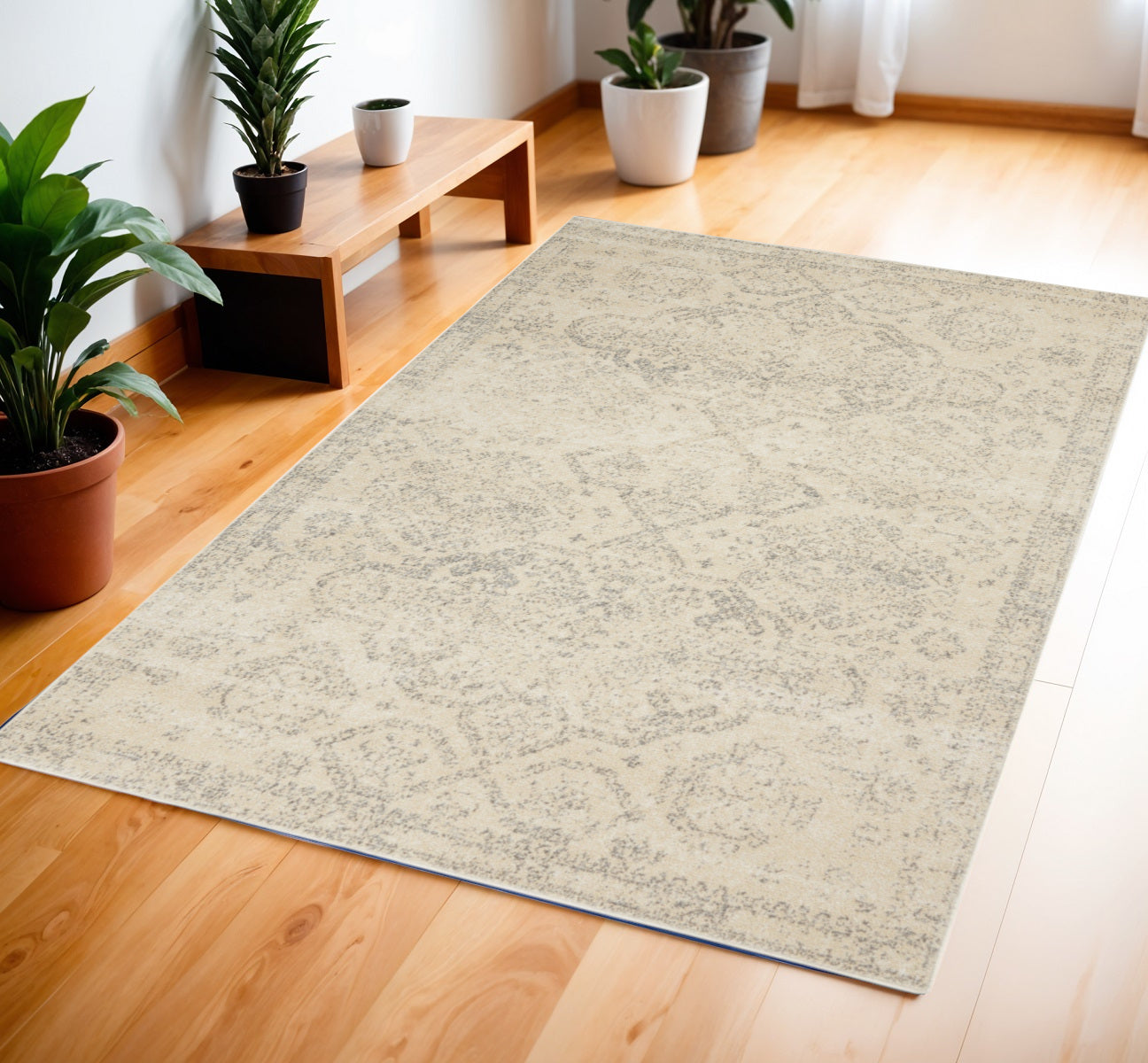 4' X 6' Beige And Gray Oriental Distressed Area Rug