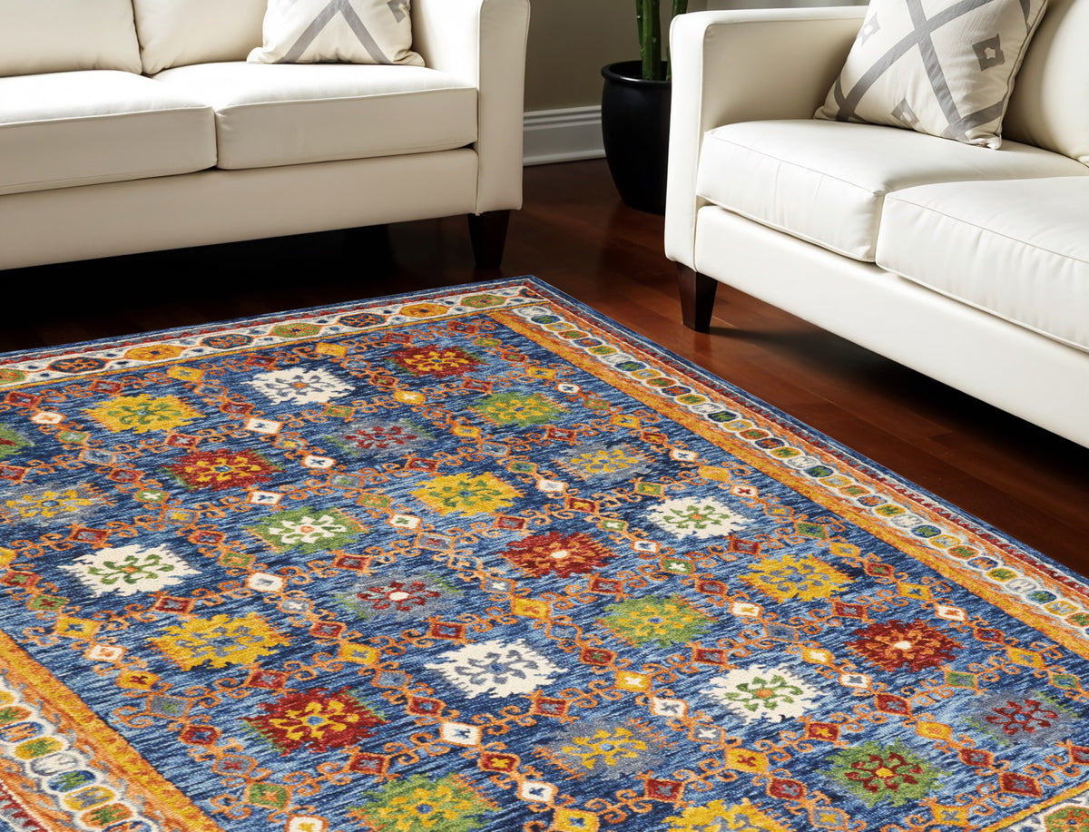 8' X 11' Navy Blue Orange And Green Wool Floral Hand Tufted Distressed Area Rug