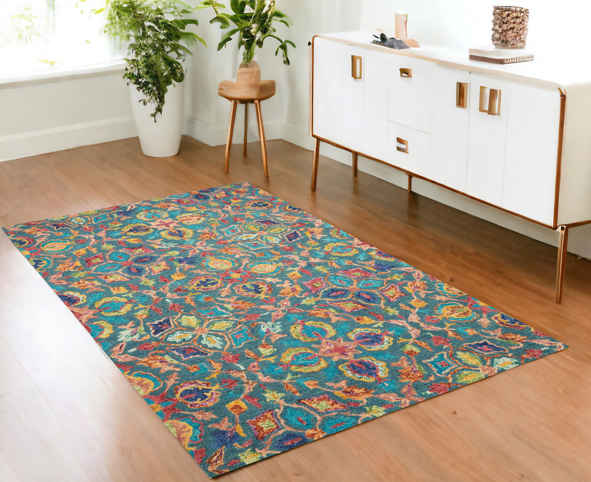 4' X 6' Teal Blue Yellow And Red Wool Floral Hand Tufted Area Rug
