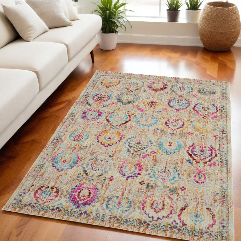 5' X 8' Ivory Pink And Orange Floral Distressed Area Rug