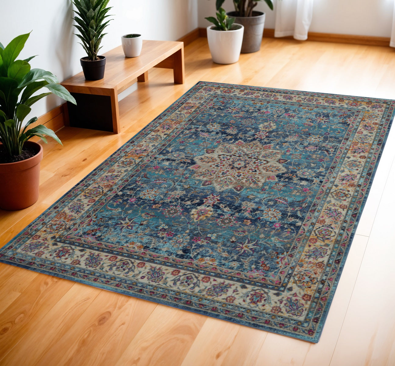 4' X 6' Blue and Beige Floral Distressed Area Rug
