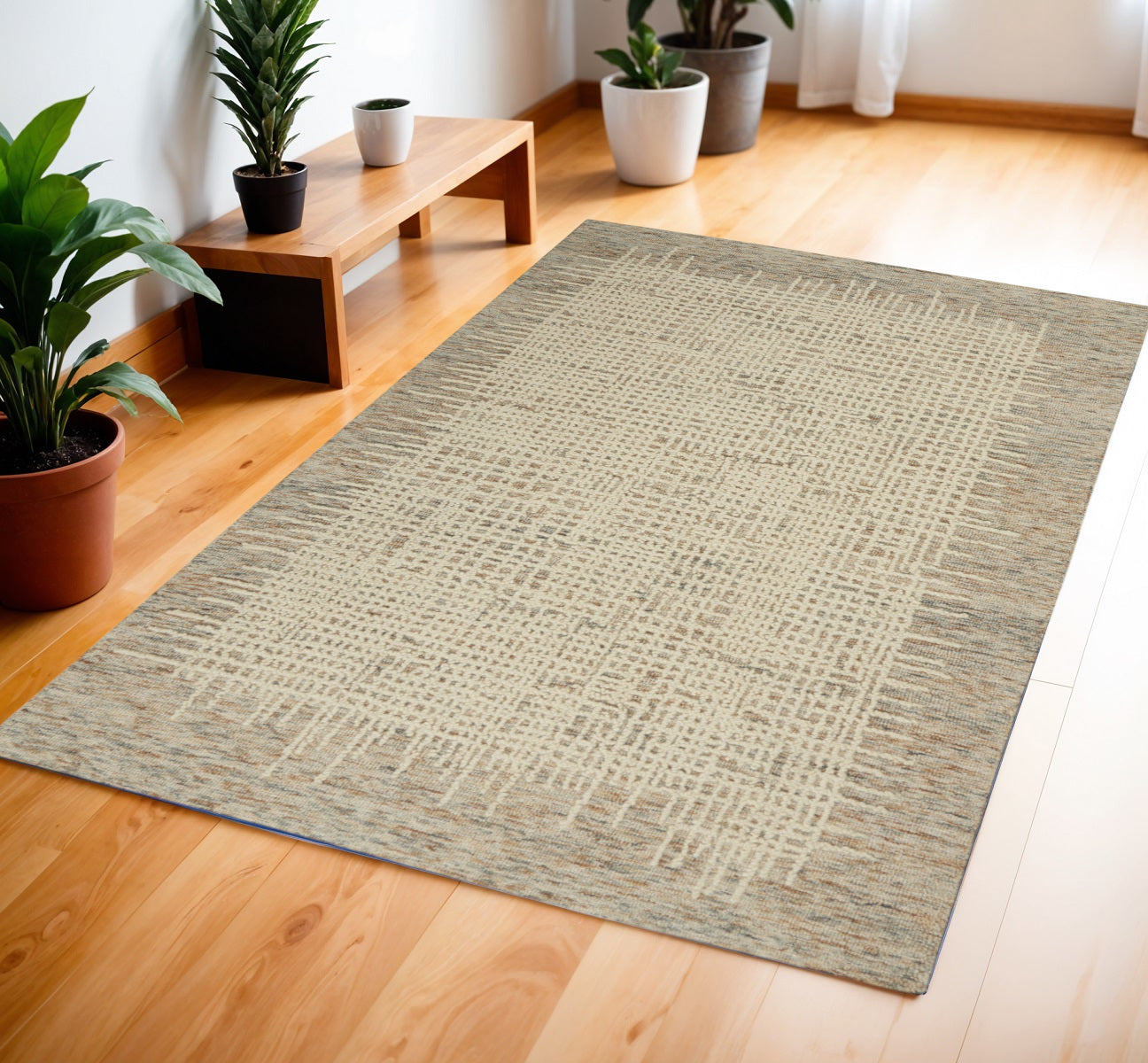 4' X 6' Beige and Tan Wool Abstract Area Rug