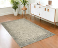 4' X 6' Ivory Brown and Gray Wool Abstract Area Rug