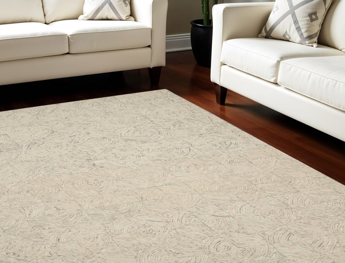 8' X 11' Ivory Tan and Gray Wool Geometric Area Rug