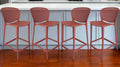 Set of Four 30'' Orange Heavy Duty Plastic Low Back Bar Height Bar Chairs