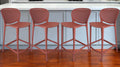 Set of Four 26'' Orange Heavy Duty Plastic Low Back Counter Height Bar Chairs