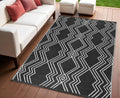 4' X 6' Black Geometric Machine Braided Distressed Area Rug With UV Protection