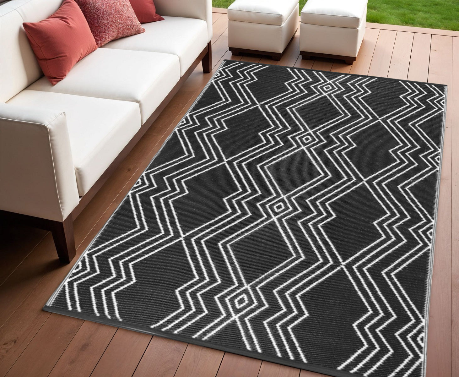 4' X 6' Black Geometric Machine Braided Distressed Area Rug With UV Protection