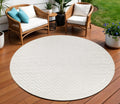 10 Ivory And White Round Geometric Indoor Outdoor Area Rug