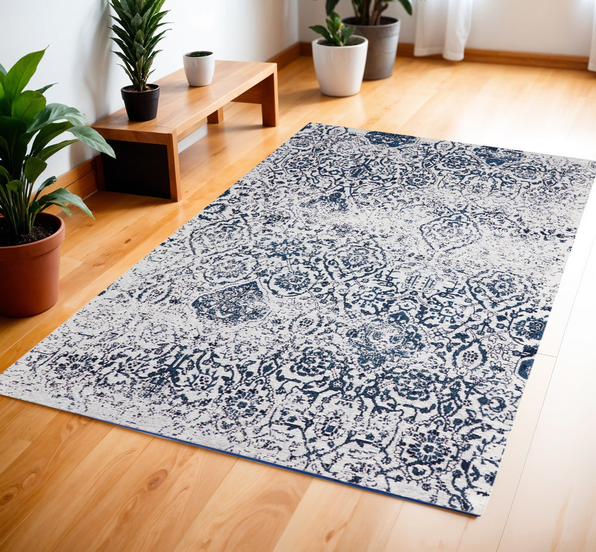 4' X 6' Navy Blue and Ivory Damask Distressed Area Rug