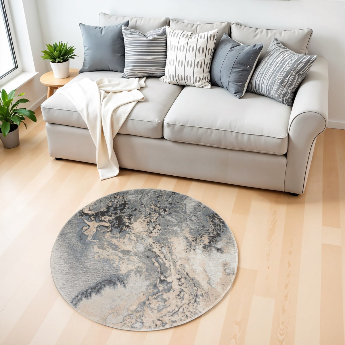 4' Gray Black and Ivory Abstract Round Rug