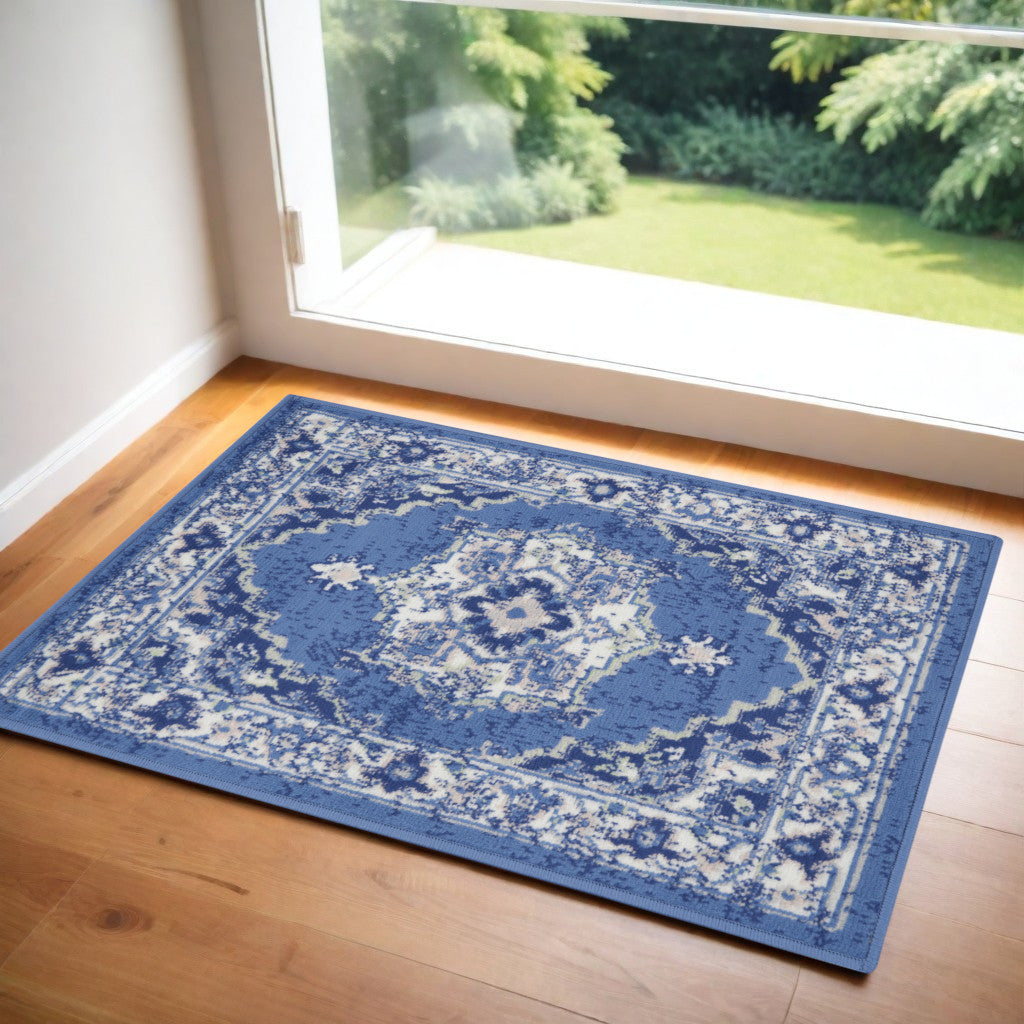 2' X 3' Ivory Navy Blue and Beige Floral Medallion Area Rug