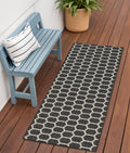 6 Black And Ivory Geometric Indoor Outdoor Area Rug
