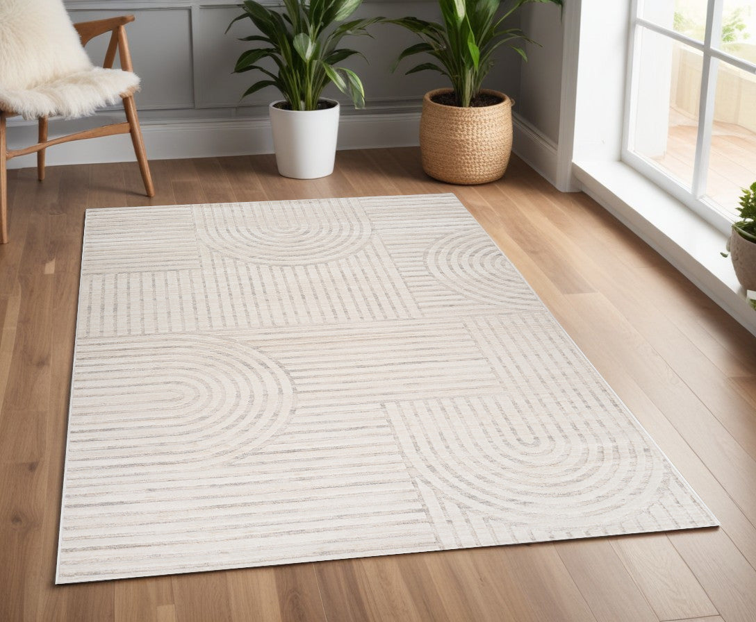 4' X 6' Cream and Beige Abstract Area Rug