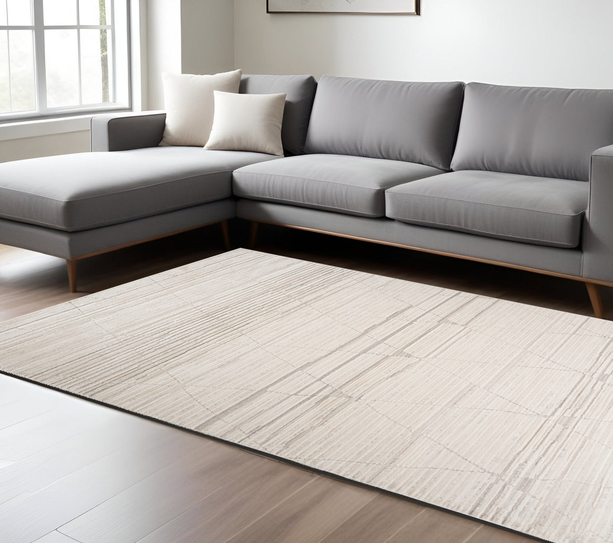 8' X 11' Cream and Beige Abstract Area Rug