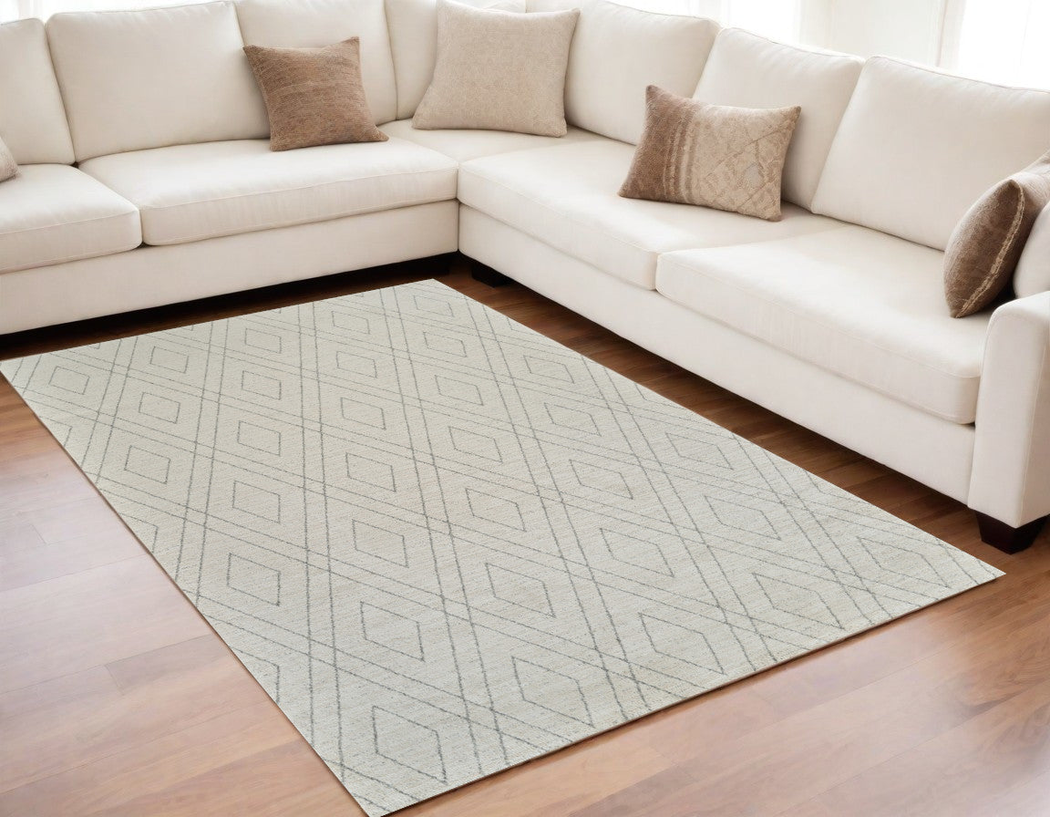 5' X 8' Beige and Gray Abstract Non Skid Area Rug