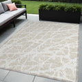5' X 8' Beige And Ivory Abstract Washable Non Skid Indoor Outdoor Area Rug
