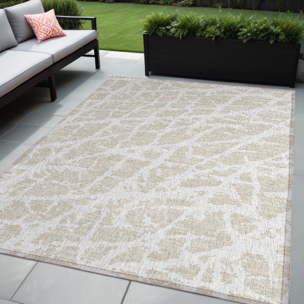 5' X 8' Beige And Ivory Abstract Washable Non Skid Indoor Outdoor Area Rug