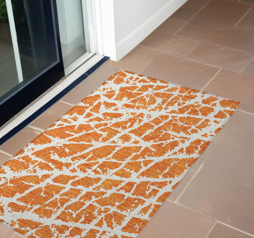 3' X 5' Orange And White Abstract Washable Non Skid Indoor Outdoor Area Rug
