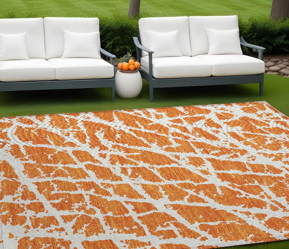 10' X 14' Orange And White Abstract Washable Non Skid Indoor Outdoor Area Rug